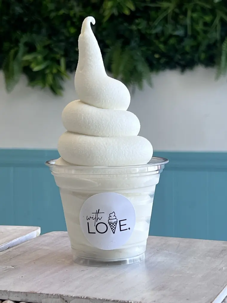 Pure milk soft serve swirled into a cup stamped with the with LOVE. logo.